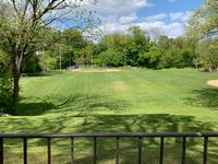 The water basin as it looks today, now a large field with a baseball diamond.